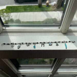 Cute silver bracelet with little charms